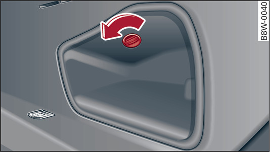 Fig. 290Revestimento lateral do lado direito da bagageira: abrir o revestimento
